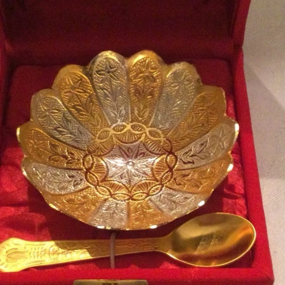 Gold and silver candy dish with serving spoon typical Indian style